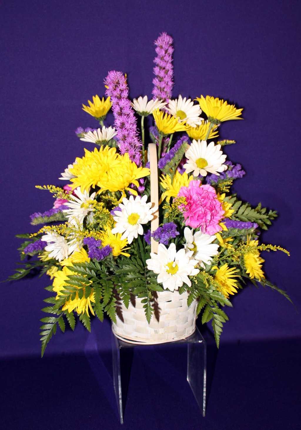 Yellow mums and white daises in a basket from Mon General Hospital Gift Shop 